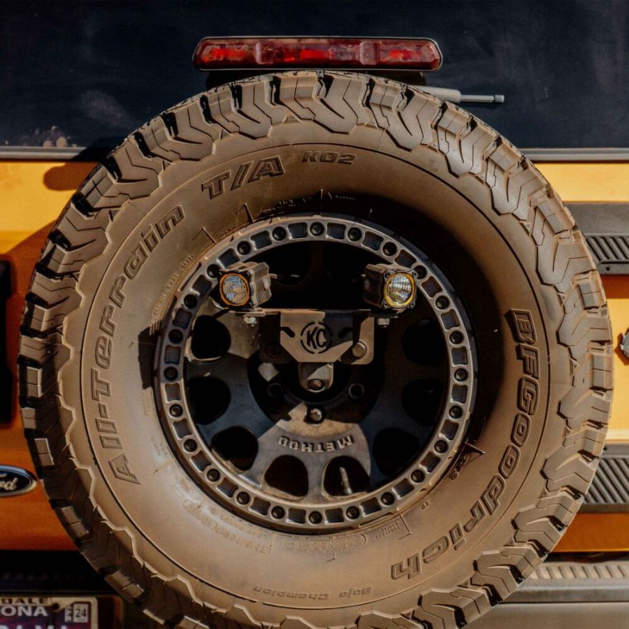 KC HILITES | Light Mount - Spare Tire Carrier - GEN4 2018+ Jeep Wrangler JL / GEN6 2021+ Ford Bronco Raptor M14x1.5 Lug Nuts (7478)