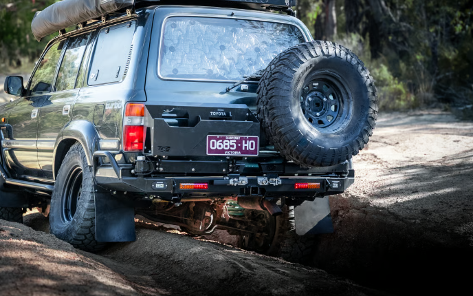 THE CRUISER COMPANY | Land Cruiser 80 Series (1991-1997) High Clearance Rear Bumper With Integrated Tow Hitch (TCC-80-RB-TOW)