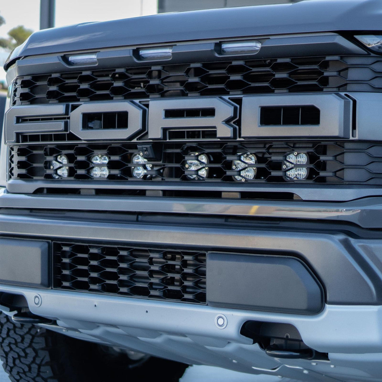 BAJA DESIGNS | Ford F-150 Raptor 2021-2024 Squadron Sport Behind Grille Light Kit (448061)