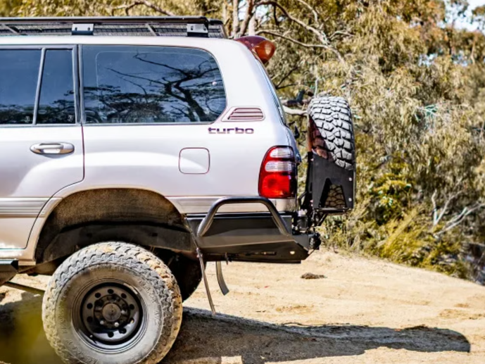 THE CRUISER COMPANY | Land Cruiser 100 Series (1998-2007) High Clearance Rear Bumper With Tow Hitch (TCC-100-RB-TOW)