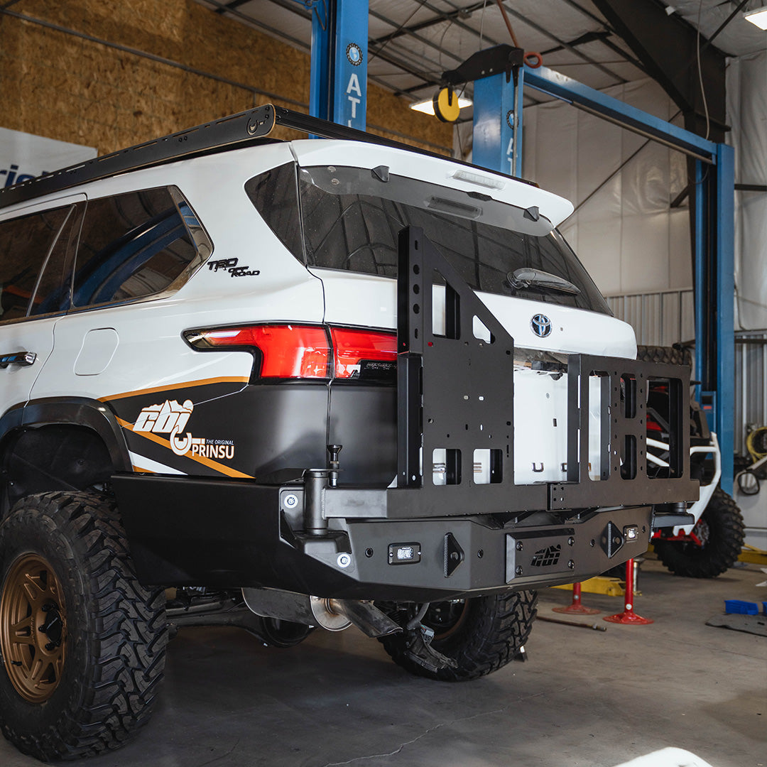 Side view of CBI Toyota Sequoia swing arms add-on